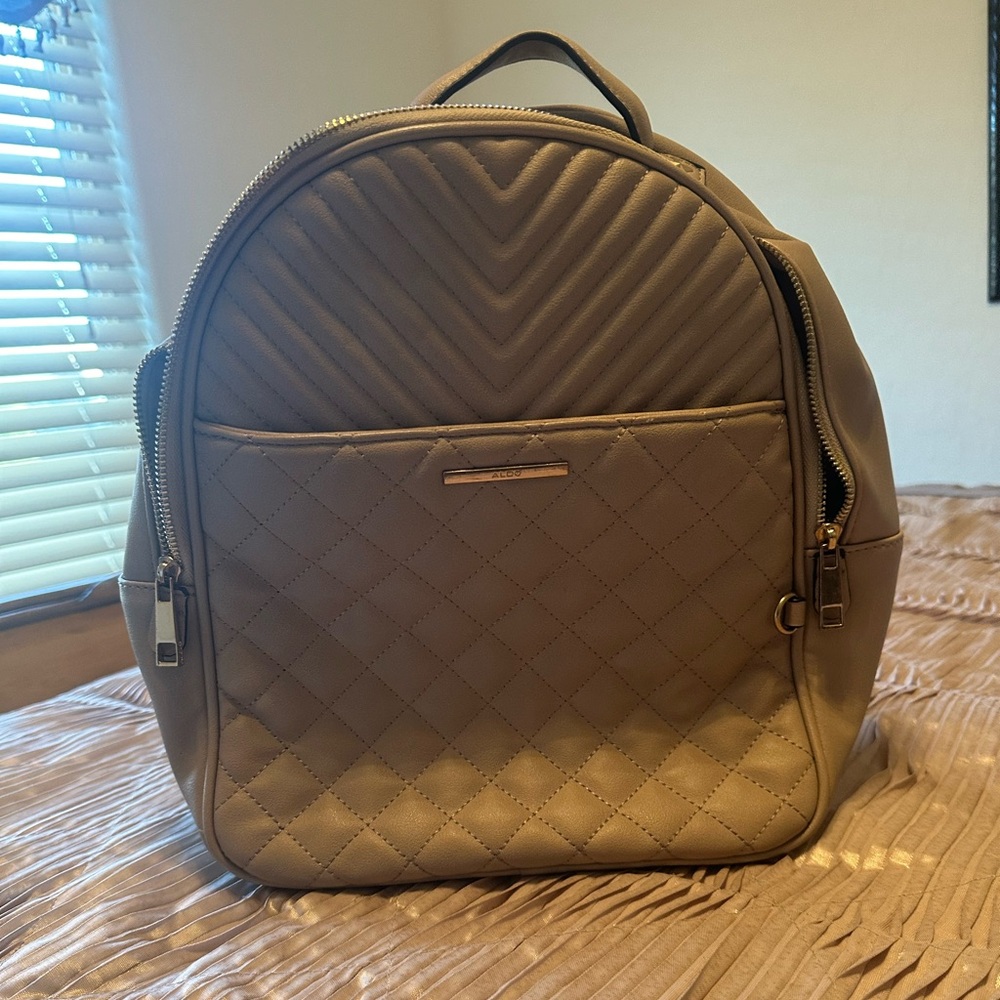 Ladies large beige Aldo brand backpack/tote. Gently used.